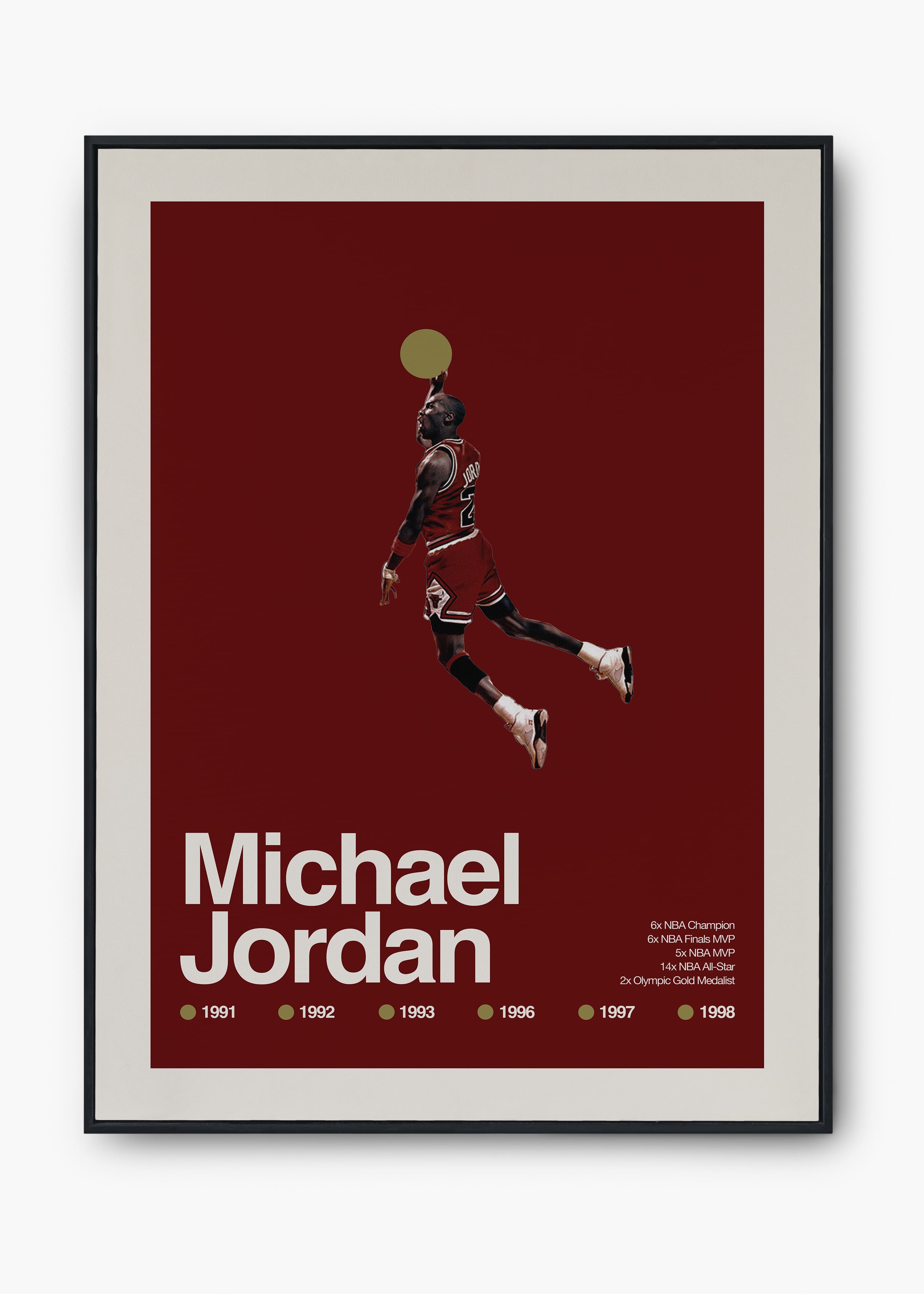 Quadro decorativo de Michael Jordan em moldura escura, pendurado em parede clara