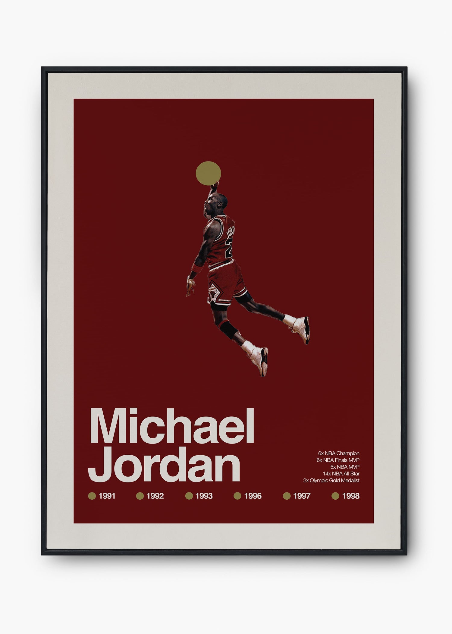 Quadro decorativo de Michael Jordan em moldura escura, pendurado em parede clara